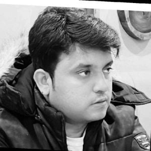 Headshot of Abid Hussain
